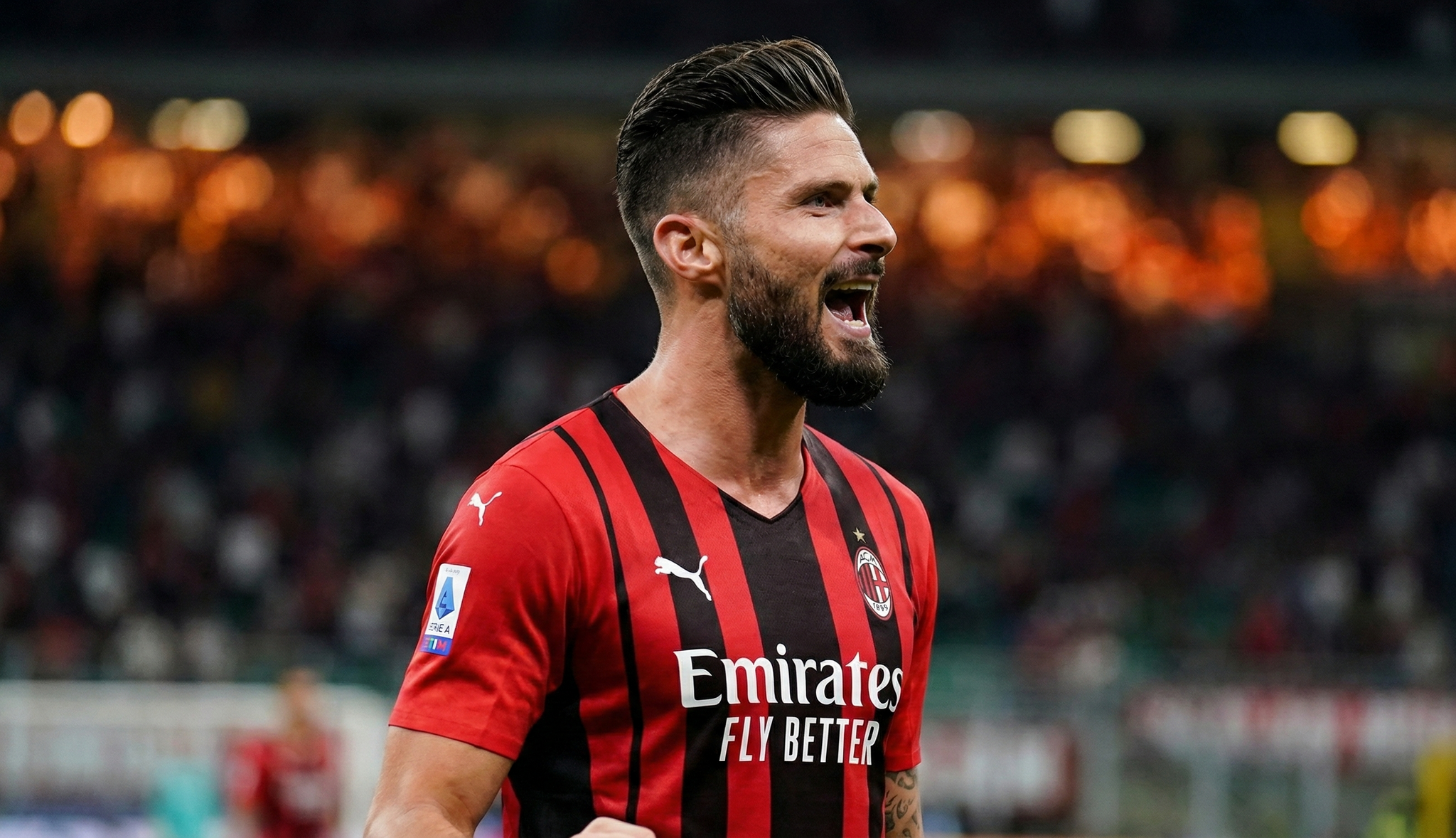 How to get the Olivier Giroud haircut – Giroud celebrating a goal for AC Milan.